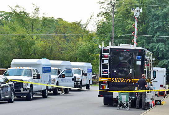 A Sheriff's Office mobile command center and three Ohio Bureau of Criminal Investigation trucks were on the scene today at 304 S. Adams St. in Middle Point.