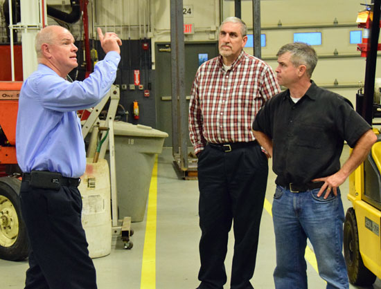 Career Technical Supervisor  Ted Verhoff (left) points out improvements in the Ag Machine area while Vantage Board of Education members Lonnie Nedderman (center) and Pat Baumle listen. Dave Mosier/Van Wert independent
