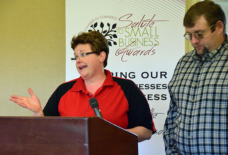 Melody Hileman of Truly D'Vine Bread Company talks about the company's success while her husband, Scott, listens (click here for more photos from the event). Dave Mosier/Van Wert independent