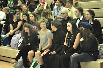 A group of junior girls won the “best group” category during the Halloween costume contest with their Addams Family outfits. (Photo by M. Tracey.)