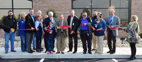 Goodwill Easter Seals officials and Van Wert store employees cut the ribbon on the new retail facility. Dave Mosier/Van Wert independent