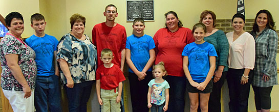 Family members of Noah Martin, as well as members of the Noah's Ark Fund Committee, are shown with a plaque honoring Noah Martin. Dave Mosier/Van Wert independent