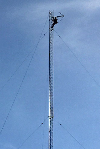 A tower worker installs the new 104.3 FM antenna atop the WERT radio tower. The station broadcasts WERT's programming 24 hours a day in stereo on FM. (photo submitted)