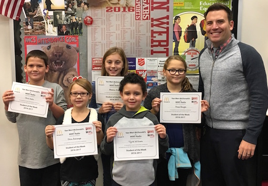 “Equality” is the Word of the Week!    Congratulations to the Van Wert Elementary School Students chosen for the Word of the Week award!  Pictured with Mr. Krogman, Assistant Principal, are students recognized for being fair and treating others equally.  Award winners this week are Tyrik, grade 1; Olivia, grade 2; Brenna, grade 3; Chris, grade 4; and Alexis, grade 5.  Each child received a free Mighty Kids Meal from our local McDonalds and a certificate from WERT Radio. (Photo submitted.) 