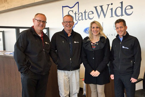Shown with YWCA Executive Director Kimberly Laudick are Andy Czajkowski, Stephen Munroe, and Brad Greve of Diamond sponsor Statewide Ford Lincoln. (YWCA photo)