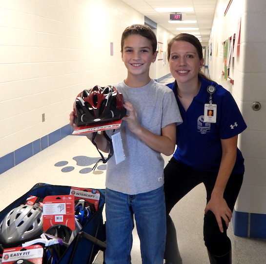 Van Wert County Hospital sponsored the annual Health Fair for the Van Wert Elementary School earlier this fall and followed up with a short quiz for each student.  The student with the highest score in each classroom received a free bike helmet from the hospital.  (Photo submitted.)