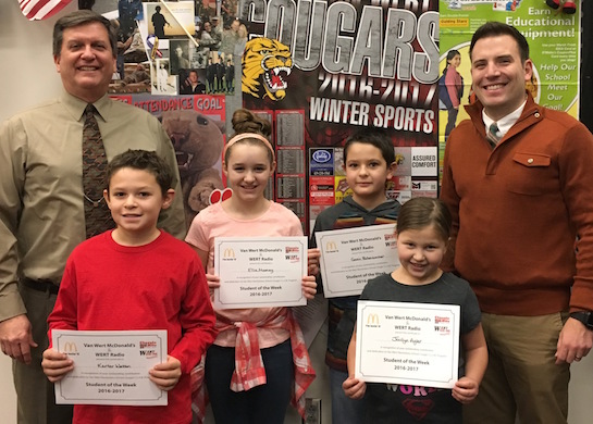 Congratulations to the Van Wert Elementary School Students chosen for the Word of the Week award!  Pictured with Mr. Gehres, Principal, and Mr. Krogman, Assistant Principal, are students recognized for showing good sportsmanship by playing fair and being gracious in winning and in losing.  Award winners this week are Jocilyn, grade 1; Gavin, grade 2; Ricky, grade 3 (not pictured); Karter, grade 4; and Ellie, grade 5.  Each child received a free Mighty Kids Meal from our local McDonalds, a free taco from our local Taco Bell, and a certificate from WERT Radio. (Photo submitted.)