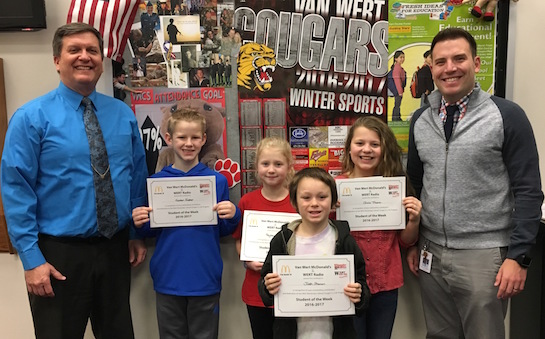 “Being Alert” is the theme for the Van Wert Elementary School Word of the Week! Pictured with Mr. Gehres, Principal, and Mr. Krogman, Assistant Principal, are students recognized for being alert and focusing in the classroom.  Award winners this week are Izaiah, grade 1; Josh, grade 2; Peyton, grade 3; Keaton, grade 4; and Olivia, grade 5.  Each child received a free Mighty Kids Meal from our local McDonalds, a free taco from our local Taco Bell, and a certificate from WERT Radio. (Photo submitted.)   
