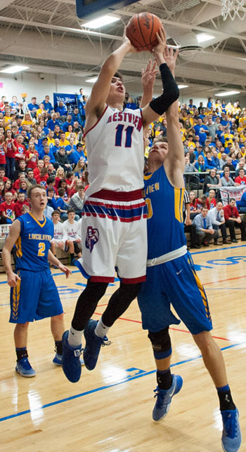 Crestview's Braden Van Cleave (11) goes up for a layup in Friday's game against Lincolnview at Crestview. Bob Barnes/Van Wert independent