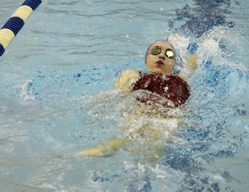 Shown is Van Wert junior Emma Verville swimming the 100-yard backstroke. (photo submitted)