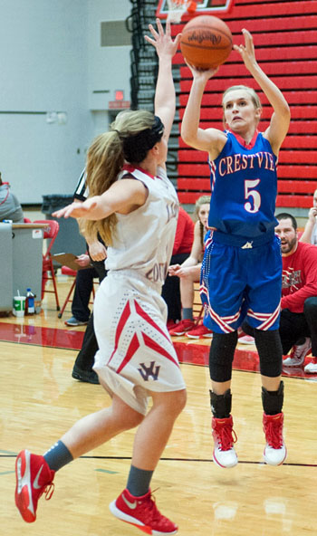 Crestview's Lexi Gregory (5) shoots over a Van Wert defender during Monday's cross-country rivalry game won by Crestview 64-46. Bob Barnes/Van Wert independent