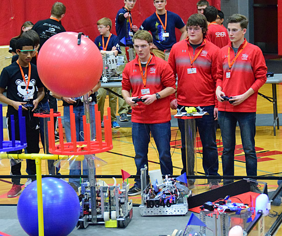 Van Wert High School Robotics Team drivers Cade Chiles, Spencer Teman, and Carter Eikenbary concentrate as they attempt to use a robot to place a large ball on top of a platform during Saturday’s Northern Ohio First Tech Challenge Ohio Qualifier held in the VWHS gymnasium. Dave Mosier/Van Wert independent