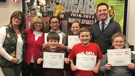 Congratulations to the Van Wert Elementary School Students chosen for the Word of the Week award! Mr. Krogman, Assistant Principal, Mrs. Anderson and Mrs. Hammond, School Secretaries, are pictured with students recognized for being helpful.  Award winners this week are Kasyn, grade 1; Jude, grade 2; Mason, grade 3; Kenlie, grade 4; and Jordanne, grade 5.  Each child received a free Mighty Kids Meal from our local McDonalds, a free taco from our local Taco Bell, and a certificate from WERT Radio. (Photo submitted.)