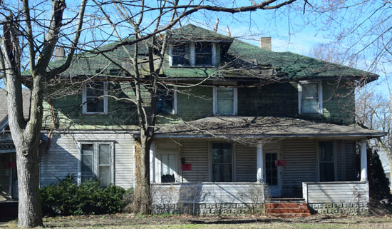 This derelict house at 421 N. Market St. will be one of the first structures demolished under a grant received by the county land bank entity. Dave Mosier/Van Wert independent