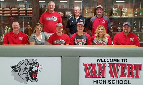 Shown are (seated, from the left) Alan Carr and Jennifer Carr, Mason Carr, Caleb Fetzer, Coral Fetzer, and Brandon Fetzer; (standing) Jeremy Kitson (VWHS assistant baseball coach), Brad Warnimont (Rio Grande University coach), Charlie Witten (VWHS head coach). (VWHS photo)