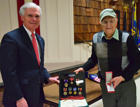 World War II veteran Orval Mullen receives medals he earned from U.S. Representative Bob Latta on Wednesday. Dave Mosier/Van Wert independent