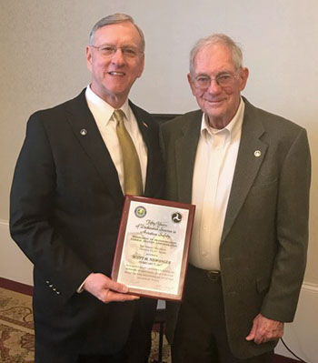 Scott M. Niswonger is joined by his former Purdue aviation professor, Charles Holleman, after receiving the Wright Brothers Master Pilot Award. (photo submitted)