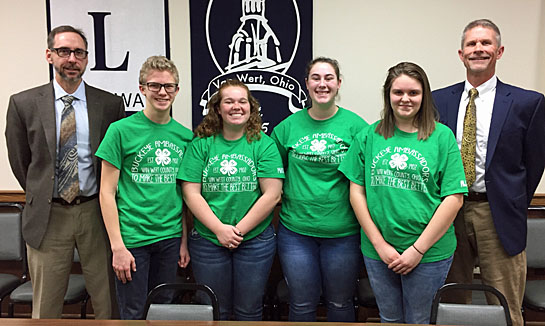 Shown are (from the left) County Commissioner Todd Wolfrum, Sam Price of the Bunny Hoppers, McKenzie Davis of Hoaglin Farmers, Macala Ashbaugh of Hoaglin Farmers, Abbey Bradford of the Bunny Hoppers, and Commissioner Thad Lichtensteiger. (photo submitted)