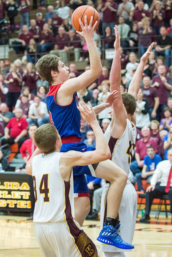 Crestview sophomore Wade Sheets (3) drives in for a layup against Kalida in Tuesday's Division IV district semifinal game at the Elida Fieldhouse. Bob Barnes/Van Wert independent