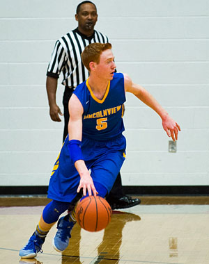 Lancer Ryan Rager (5) brings the ball up the court during Saturday's Division IV sectional championship game against Crestview. Bob Barnes/Van Wert independent