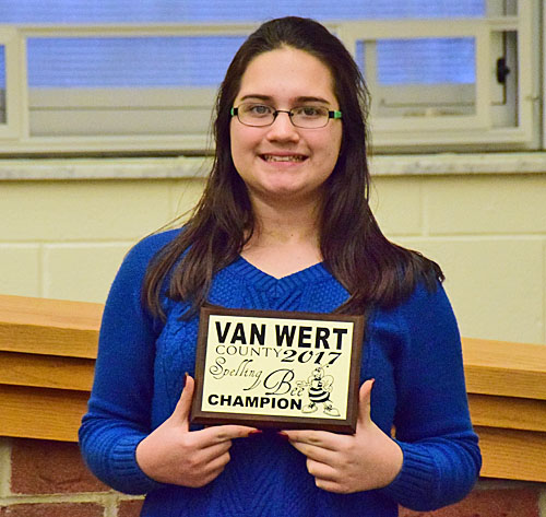 Van Wert County Spelling Bee champion Una VanWynsberghe holds the plaque she won for winning the spelling contest. This is the second consecutive time the Lincolnview seventh-grader has won the county spelling bee. Last year, she also finished as a semifinalist in the Scripps Howard National Spelling Bee. Dave Mosier/Van Wert independent