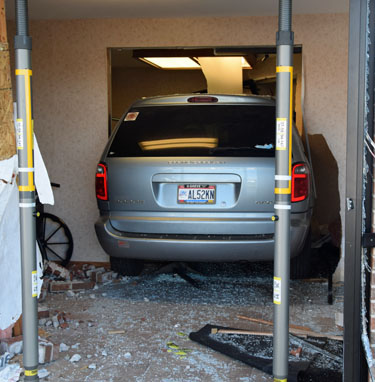 This minivan crashed into -- and through -- the entrance of a medical building at 1180 Professional Drive. The vehicle ended up in the waiting room of Van Wert County Hospital's Pediatric Rehabilitation Clinic. Dave Mosier/Van Wert independent