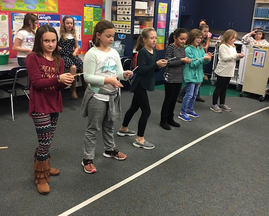 Christie Wendel's 4th grade science class is studying mechanical energy. Students experimented to determine if more potential energy led to more kinetic energy. They used launchers with springs to test their hypotheses and had fun figuring out the results.  (Photo submitted.)
