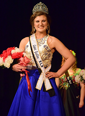 2017 Peony Queen Katlyn Wendel promenades for the first time after being crowned on Friday night.