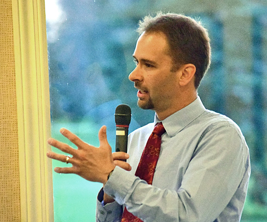 Bob Spath, Project Lead the Way teacher and Van Wert High School Robotics Team advisor, talks about his faith during the YMCA's annual Good Friday Breakfast at Willow Bend Country Club. Dave Mosier/Van Wert independent