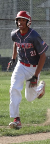 Jonathon Lee scores a run in the second inning for the Cougars. Scott Truxell/Van Wert independent
