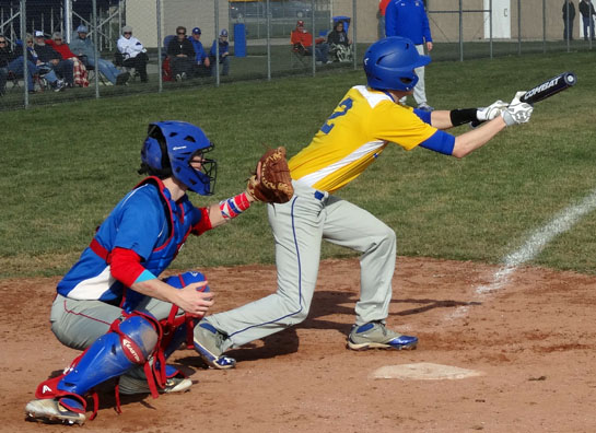 Lancer Gavin Carter (2) squares off for a bunt in Saturday's game against Wayne Trace. Scott Truxell/Van Wert independent