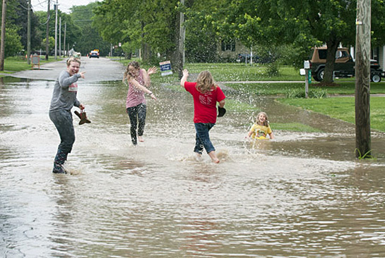 Flood image-kids playing on Burt St. 5-25-17
