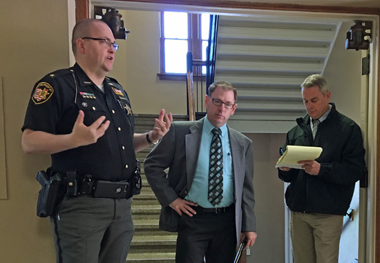 Van Wert County Sheriff Tom Riggenbach, Lincolnview Superintendent Jeff Snyder, and curriculum director Jeff Humason discuss successes and areas for improvement with faculty and staff following the completion of the evacuation drill. (photo submitted)