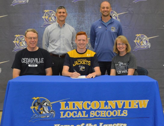 Lincolnview graduate Ryan Rager has signed to run track for Cedarville University. He is joined by his parents, John and Sherry Rager, as well as Lincolnview Athletic Director Greg Leeth and Head Track and Field Coach Matt Langdon. (photo submitted)