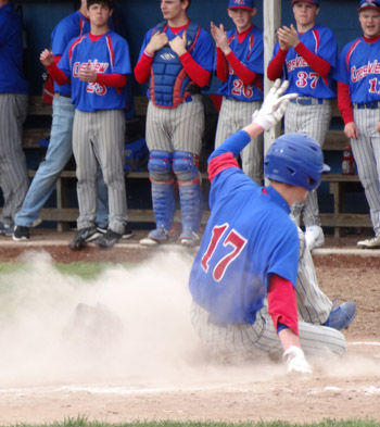 Crestview's Jacob Painter slides safely into home during Thursday's game. Scott Truxell/Van Wert independent
