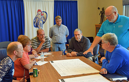 Crestview Local Board of Education members and district administrators view updated designs as architect Brad Germann discusses changes made based on previous discussion. Dave Mosier/Van Wert independent