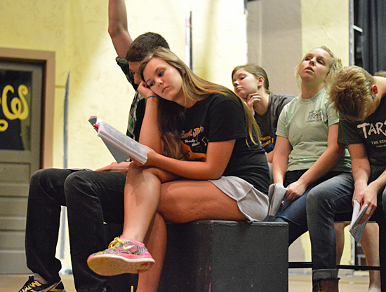 Recent Delphos St. John’s graduate Lexi Pohlman, who plays “Linda” in the musical, rehearses a classroom scene with her castmates.  (VWCT photo)