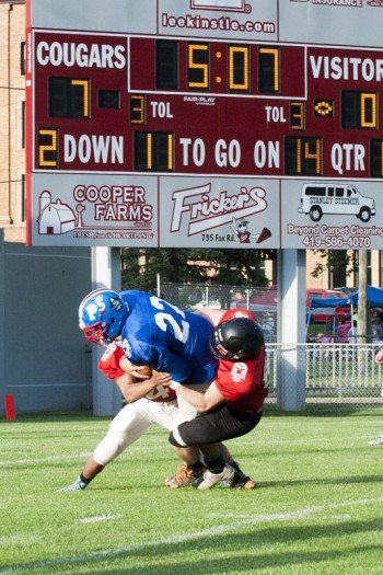 Crestview's Braden Van Cleave is tackled after catching a pass. Bob Barnes/Van Wert independent